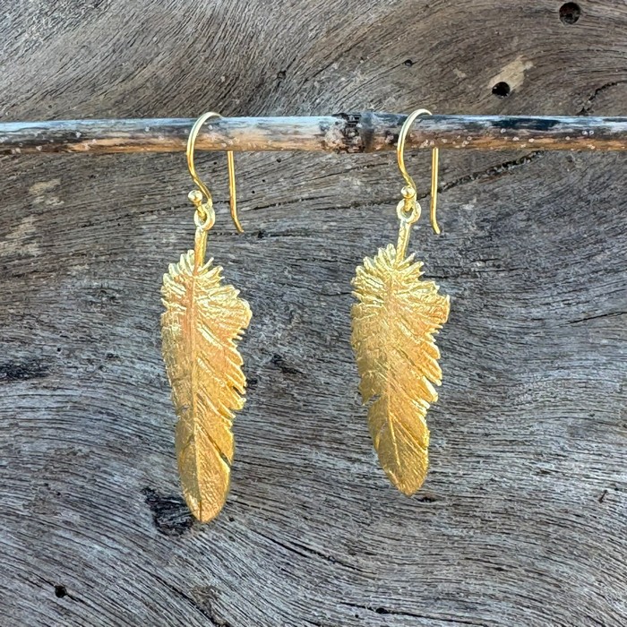 gold feather earrings